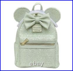 Disney Parks mint green loungefly Sequin mini backpack and wristlet SOLD OUT